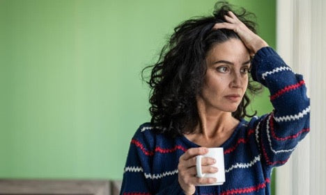 a menopausal woman experiencing insomnia